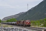 CP 8723/9753/9617 leading a mixed freight consist W/B through Mt. Laurie crossing in Exshaw, Alberta